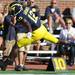Michigan wide receiver Devin Gardner runs the ball in for a touchdown against UMass in the second quarter at Michigan Stadium on Saturday. Melanie Maxwell I AnnArbor.com